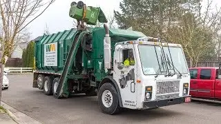 Mack LE - Amrep Octagonal Side Load Garbage Truck