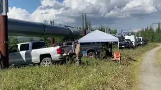 Drone operators along pipeline with Starlink for fireline mapping and hot spot monitoring