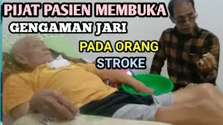 PIJAT PASIEN MEMBUKA GENGAMAN JARI PADA ORANG STROKE