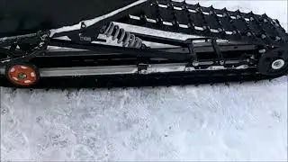 A simple option for suspending a snowmobile track on skids