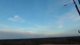 Rival Paramotor gangs meet in the sky at sundown.