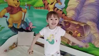 Anya plays catch-up and hide and seek with her mother. I'm a storyteller for children
