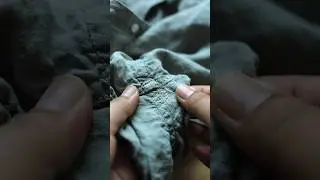 Mending a hole and using a glue stick to tack down the fabric