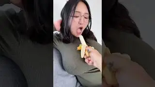 Aroomi Kim sucks banana. 