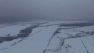 Круг в хмуром зимнем небе Сахалина...