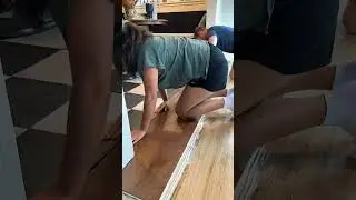 installing a wood transition strip next to our kitchen tile #homerenovation