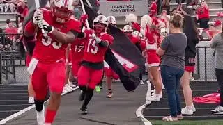 WATCH NOW: Davenport West coach Dominique Nunn leads the Falcons onto the field (Aug. 30, 2024)