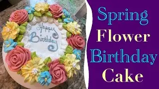 How to make and arrange colorful buttercream spring flowers on a cake. Delicious vanilla frosting.