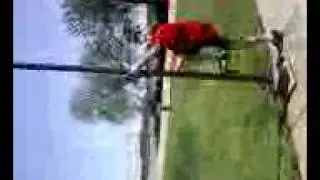 Ben climbs pole at arch