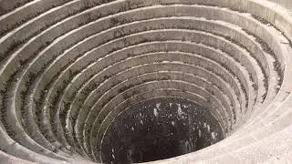 Walking down the plughole at ladybower reservoir