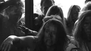 Slow motion out take of zombies entering store during commercial shoot
