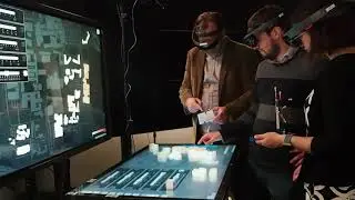 Uplift: A Tangible and Immersive Tabletop System for Casual Collaborative Visual Analytics