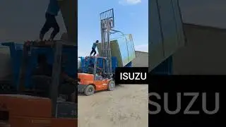 unloading oversized cargo. Truck ISUZU.