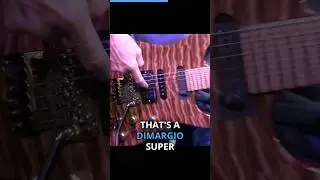 Def Leppard's Phil Collen shows off one of his signature guitars, the Jackson PC1! 