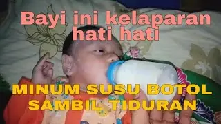 Hati hati bayi ini nyusu botol sambil tidur