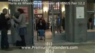 P55: Maria as wheelchair paraplegic pretender at VENUS fair 12.2