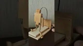 Деревянный танцующий человечек 