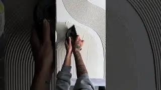 Artist is showing how to create and clean a textured art canvas!