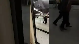 Alstom Metropolis AM5-M4 departs (metro door view)