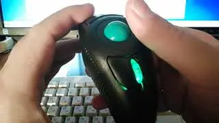 Unpacking wireless mouse with trackball from Aliexpress.