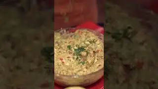 Healthy avocado food mixed with onions and tomatoes