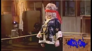 BULLSEYE! MAGICIAN FIRES ARROW THROUGH ASSISTANT'S STOMACH-- AND HITS THE TARGET!