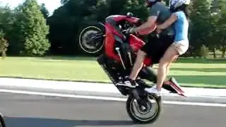 moto pareja caballito