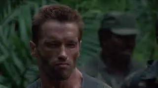 The predator is hiding from the group shooting at him