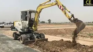 Mini Excavator. |Excavation|  | Kerb Stone Excavation|.