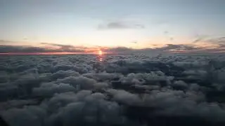 Flight through the sky to the sunset