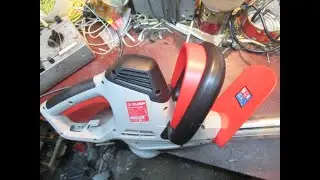 ZUBR brush cutter. Anchor rewinding.