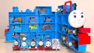 Put Thomas the Tank Engine toys in a large case