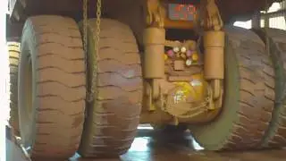 REFUELING GIANT DUMP TRUCKS