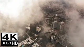 CLOUDS MOVING THROUGH AND ABOVE THE CITY (FREE STOCK VIDEO) 4K