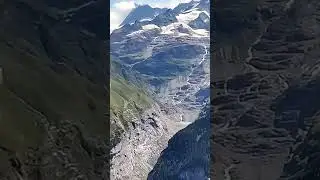 Alpes Suíços🇨🇭#alpes #swiss #swisland #svizzera #vôo #paragraider #parapente #sport #radical #shorts