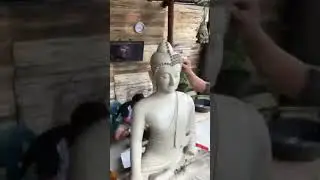 Talented man making Buddha.......
