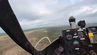 Gyrocopter fly over town west of Darwin