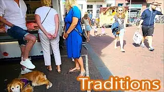 Fish, herring, dog. Live music near the Dutch farmers market. Street Organ Louise. Draaiorgel