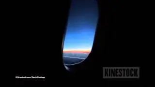 0000172 plane window at dusk KINESTOCK