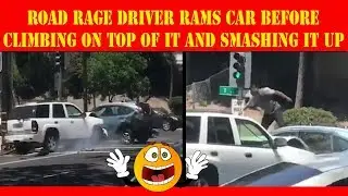 **CAUGHT ON FOOTAGE** Road rage driver rams car before climbing on top of it and smashing it up