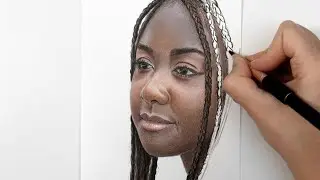Coloring a realistic portrait with colored pencils