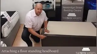 Attaching floor standing headboard to a divan base
