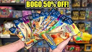 CHARIZARD PULLED in a BOGO 50% OFF POKEMON CARDS DEAL AT GAMESTOP! Opening Cheap Packs