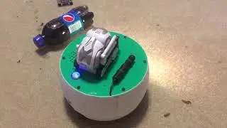 Cozmo rides Telly bot