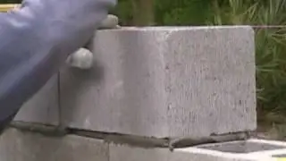 Concrete block placement onto mortar - explained