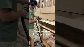 Tom’s been busy. Look at that stack of beams. He took a break to sand a mantel real quick.