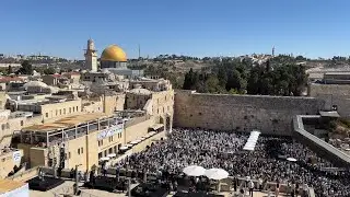 Traditional priestly blessing (birkat kohanim) in Sukkot at the Western Wall in Jerusalem. 2024