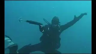 Frogwoman Scuba fight with Harpoon diver