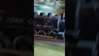 Паровоз NYC с вагоном чистит рельсы.