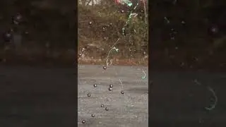 Paintballs vs Badminton Racket!  #shorts #paintball #slowmotion